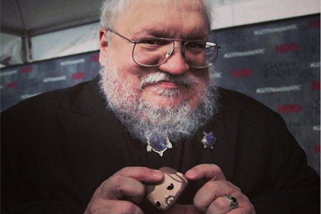 George R. R. Martin poses with Poor Dead Ned's Head